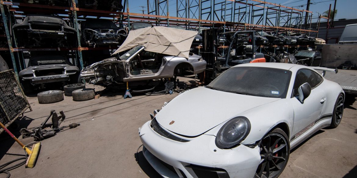 A white Porsche at the Los Angeles Dismantler yard in Sun Valley California.