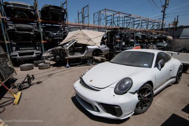 A white Porsche at the Los Angeles Dismantler yard in Sun Valley California.