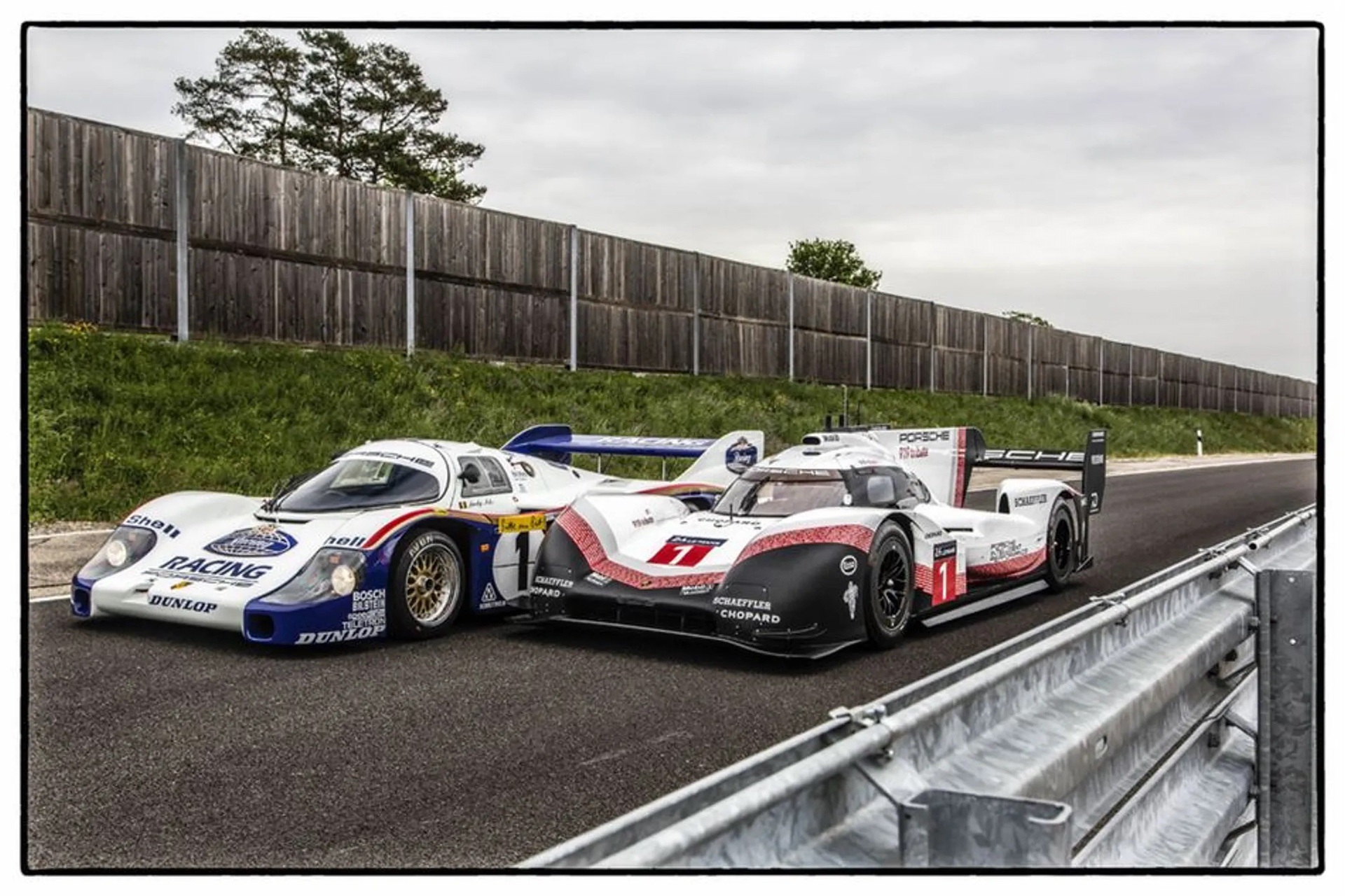 Side by side view of a Porsche 956 and a Porsche 919