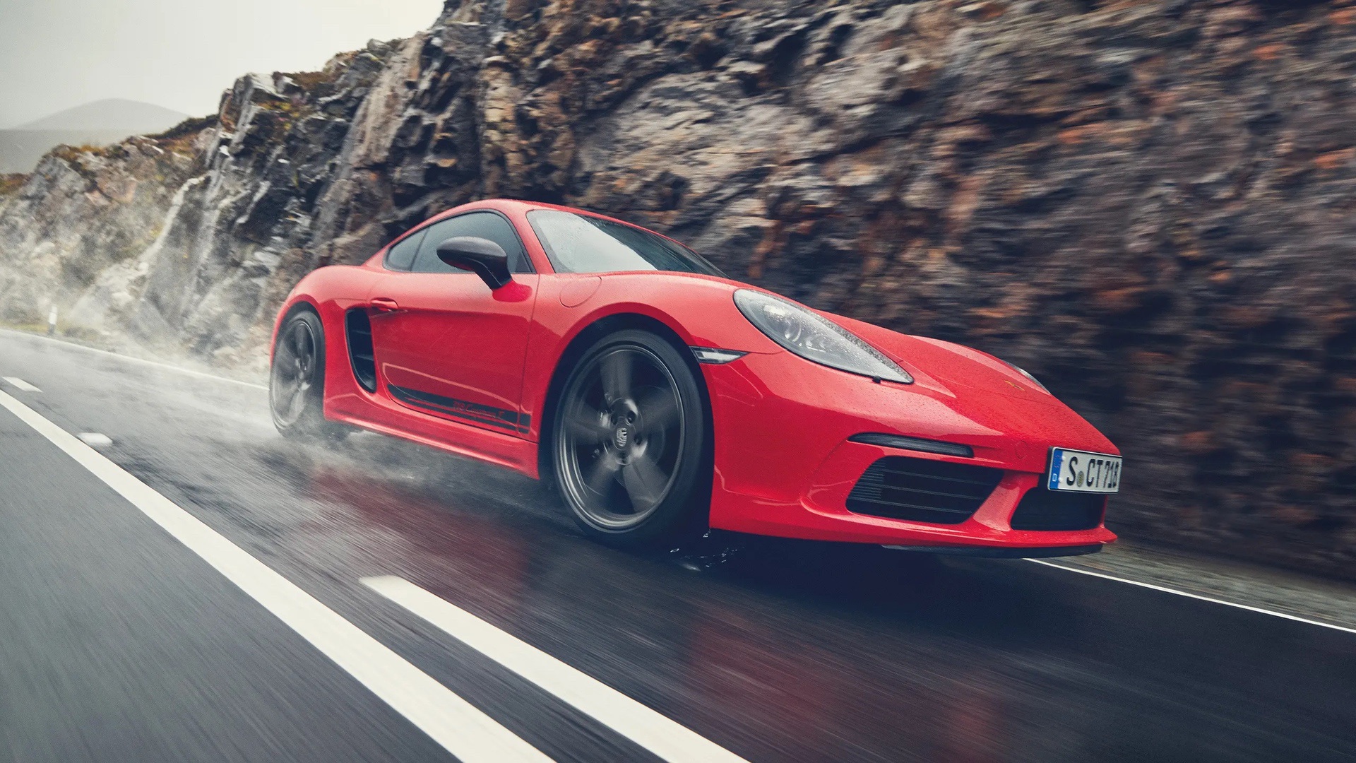 Wet or dry, we would choose the Porsche 718 Cayman S as our daily driver, but only after giving the Lotus Emira a very long look and a test drive or two. The two are that close.