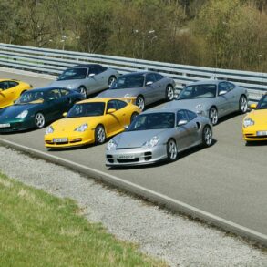 Complete Porsche 996 range in 2004 parked on road