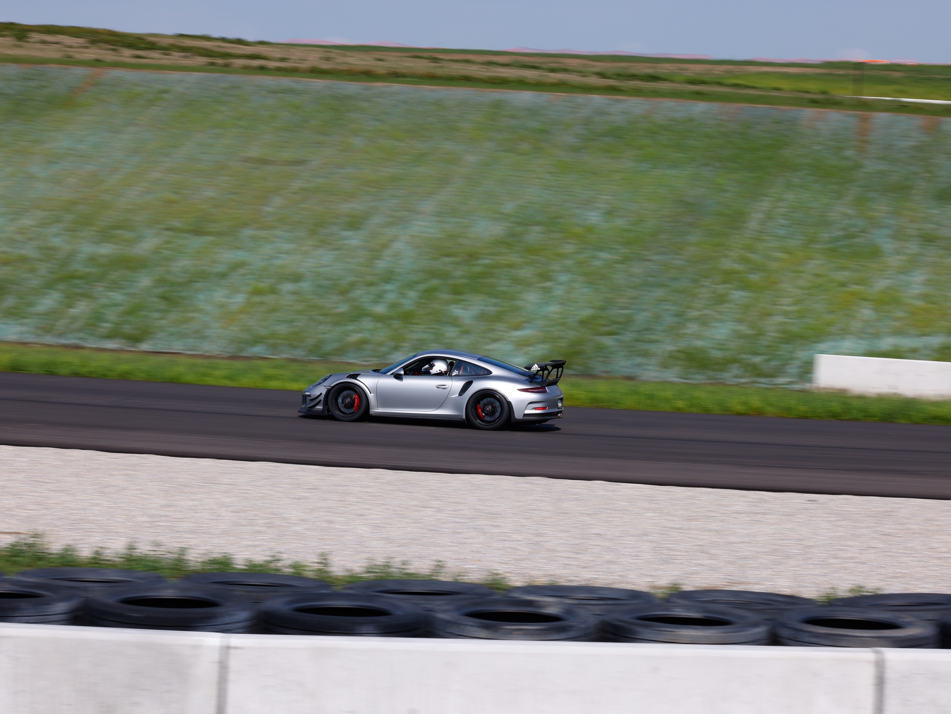 Side view of Porsche 991.1 GT3 RS on track