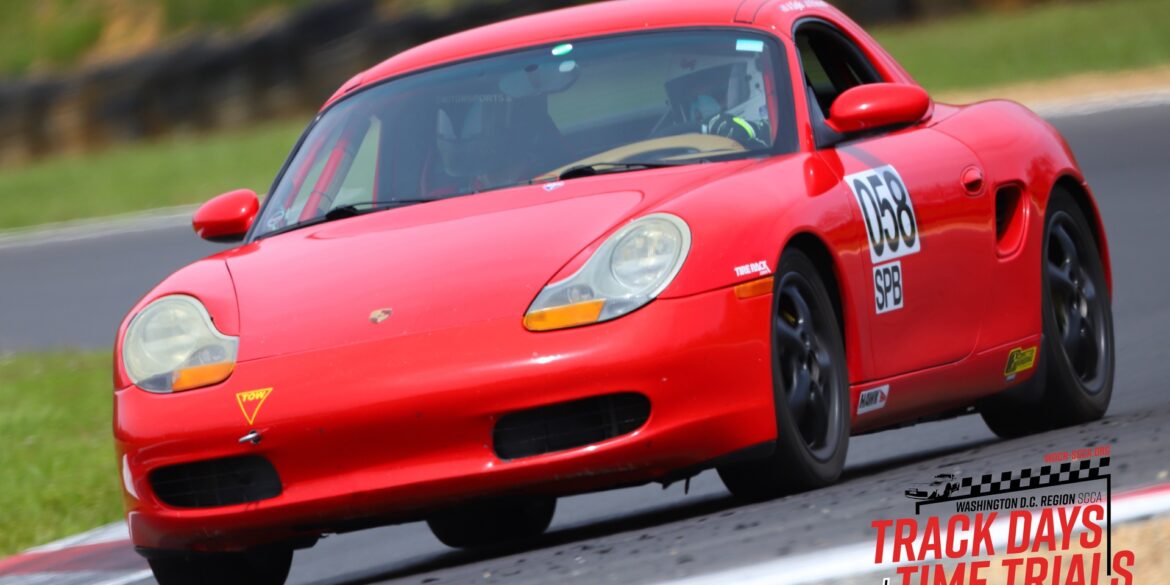 Ross Vincenti's 1998 Porsche Boxster Spec Race Car speeding on track