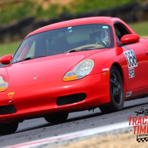 Ross Vincenti's 1998 Porsche Boxster Spec Race Car speeding on track