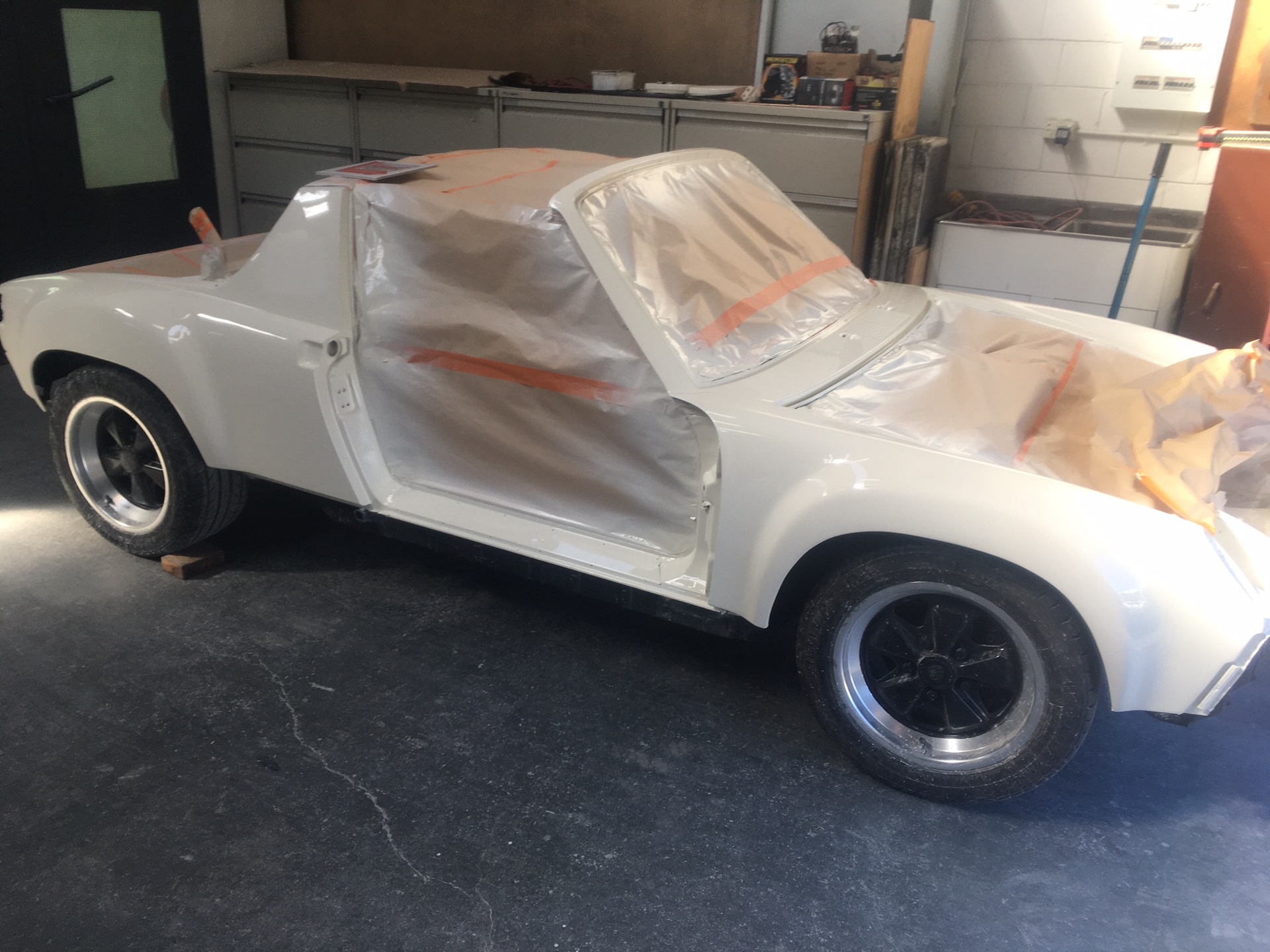 The first coat of clearcoat and paint sealant near the end of the restomod project