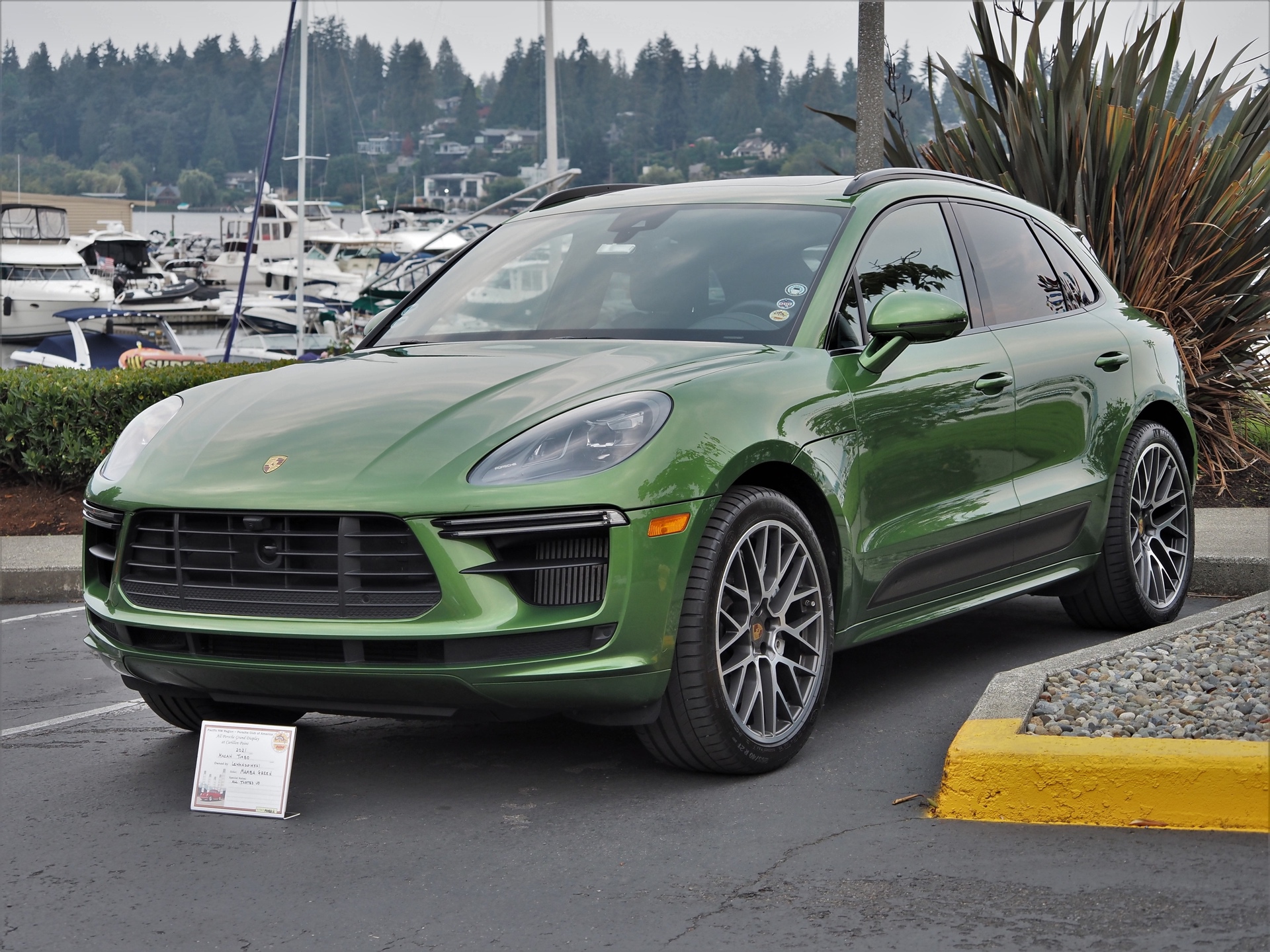 Green 4-Door Porsche SUV