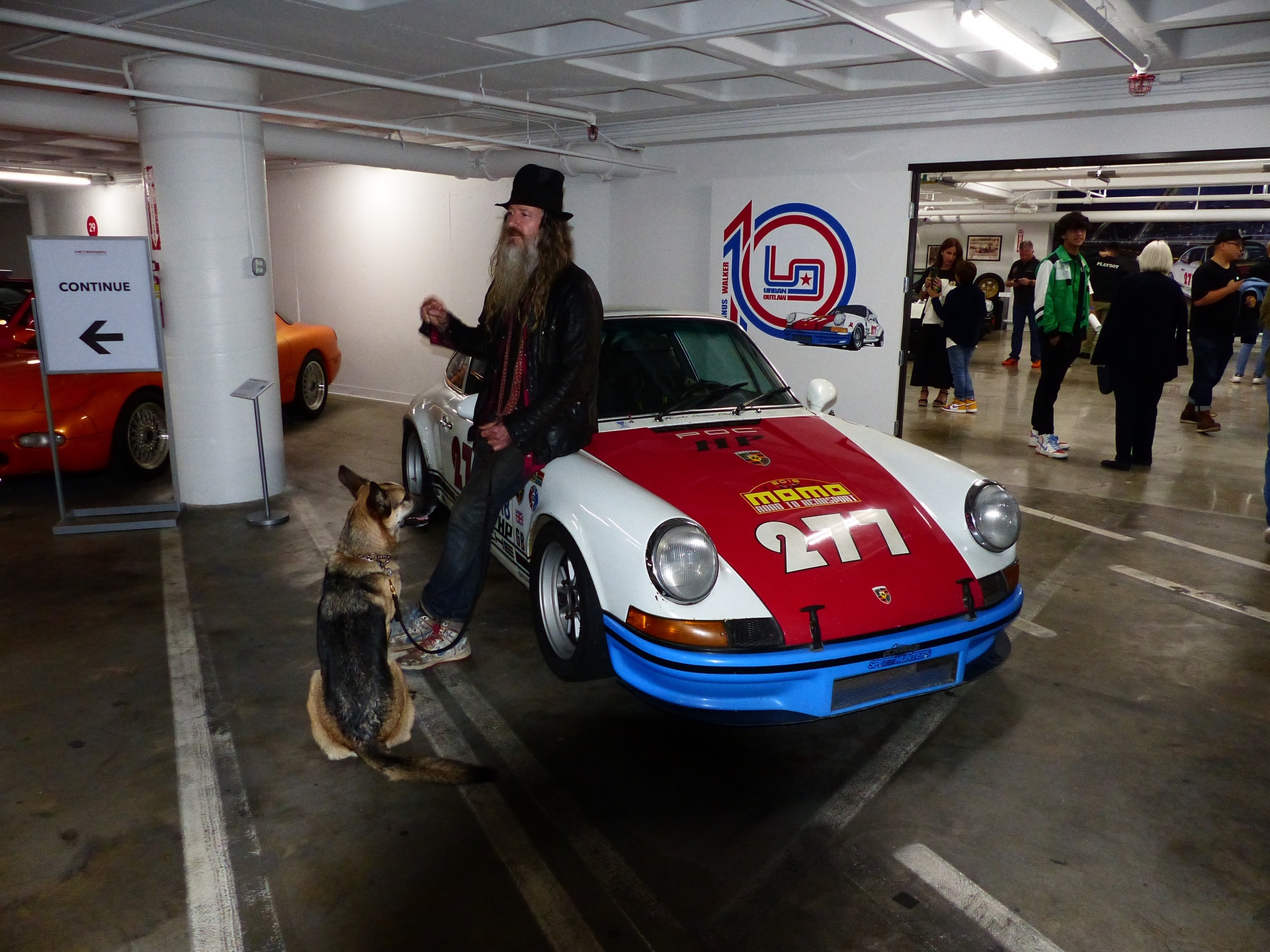 Magnus Walker at entry to new exhibit at Petersen Automotive Museum