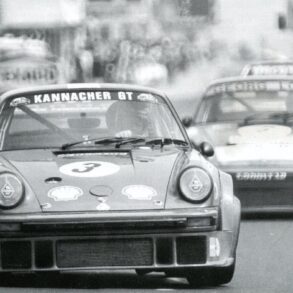 Porsche 934 ahead of other cars during race