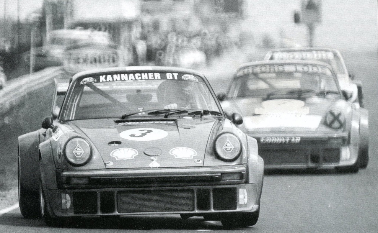 Porsche 934 ahead of other cars during race