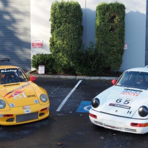 Porsche cars parked in lot