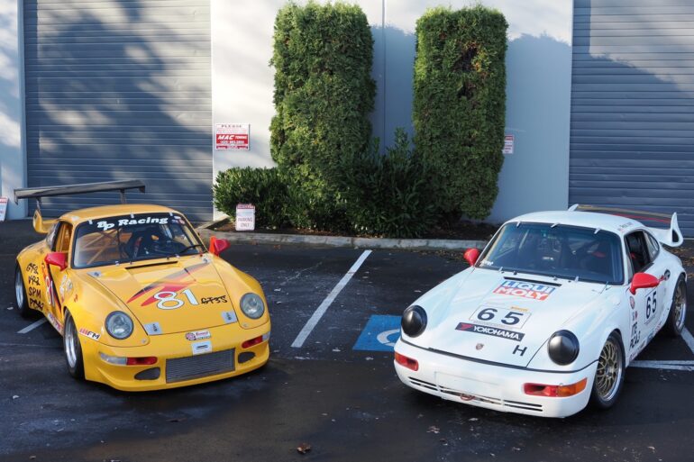 Porsche cars parked in lot