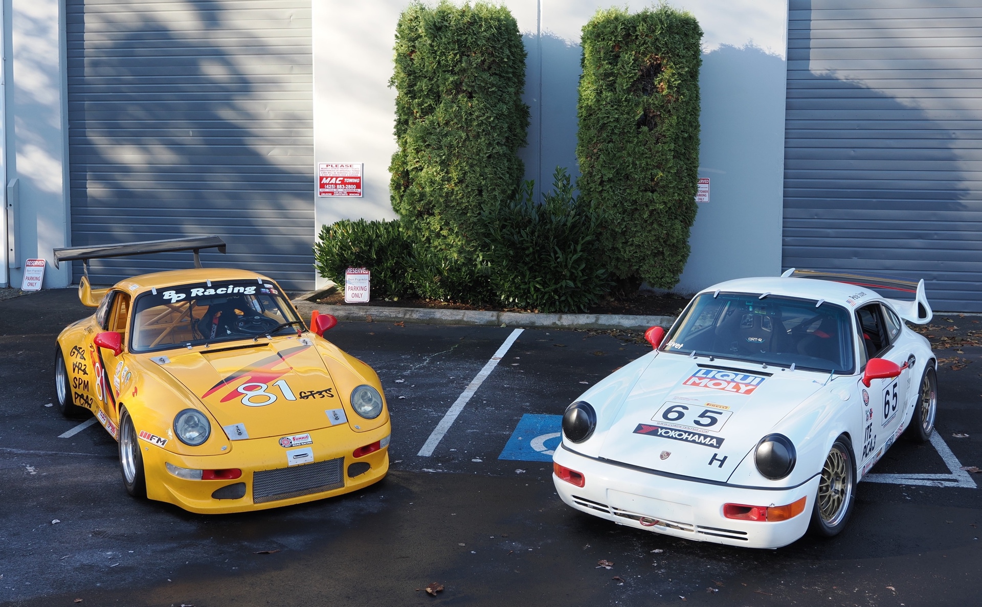 Porsche cars parked in lot