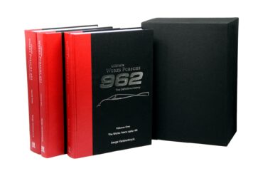 Box set for Ultimate Works Porsche 962 - The Definitive History on white background