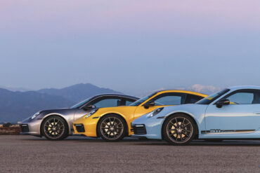 Various colors of Porsche 911 models.