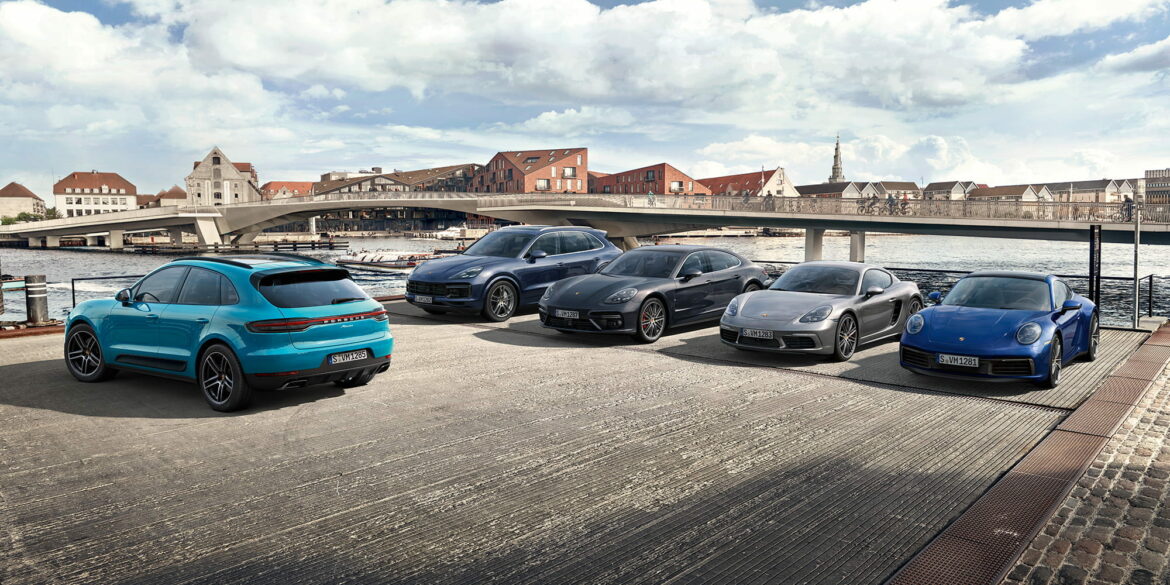 Studio shot of various Porsches outside