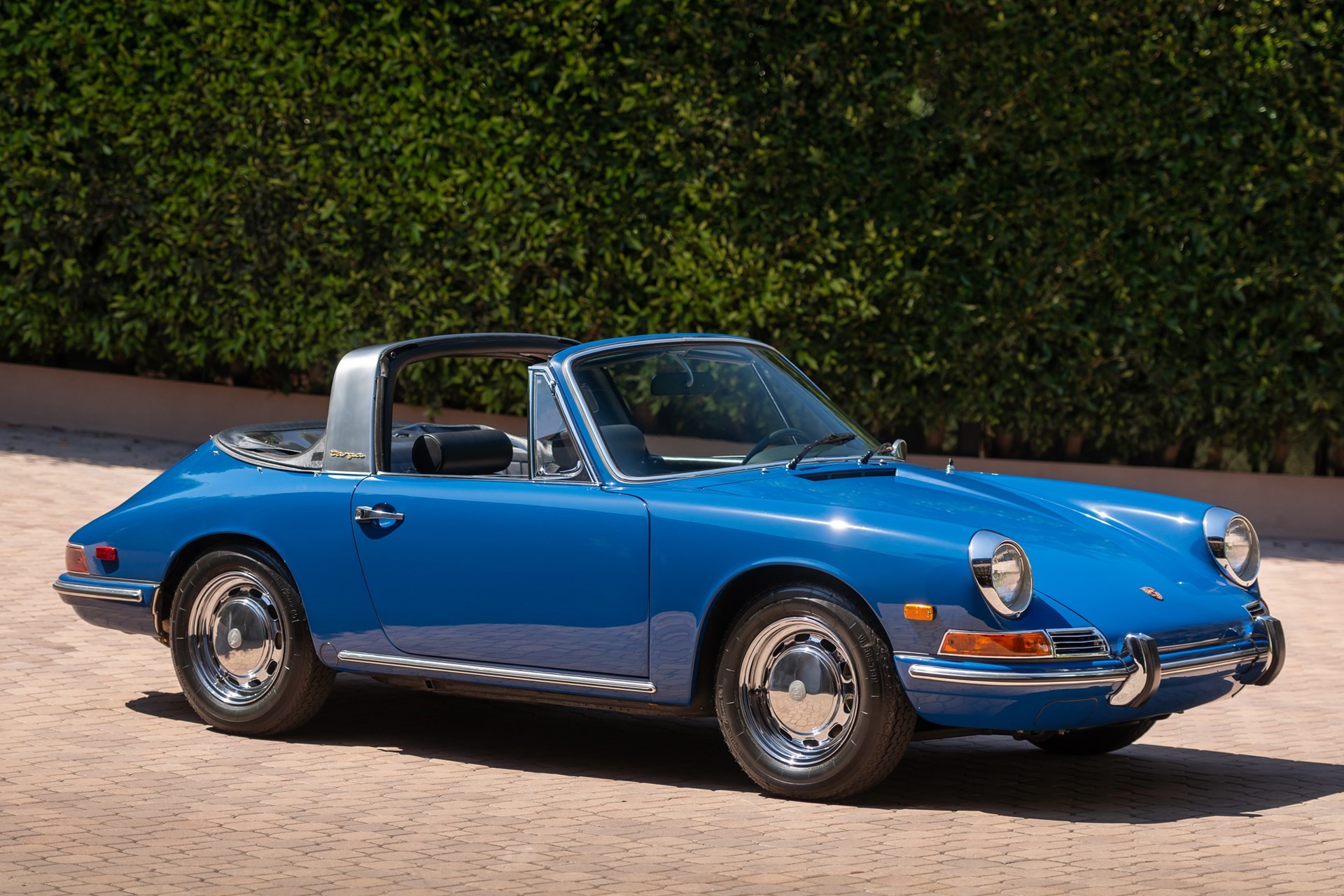 Front-angled view of a blue 1968 Porsche 911T Targa.