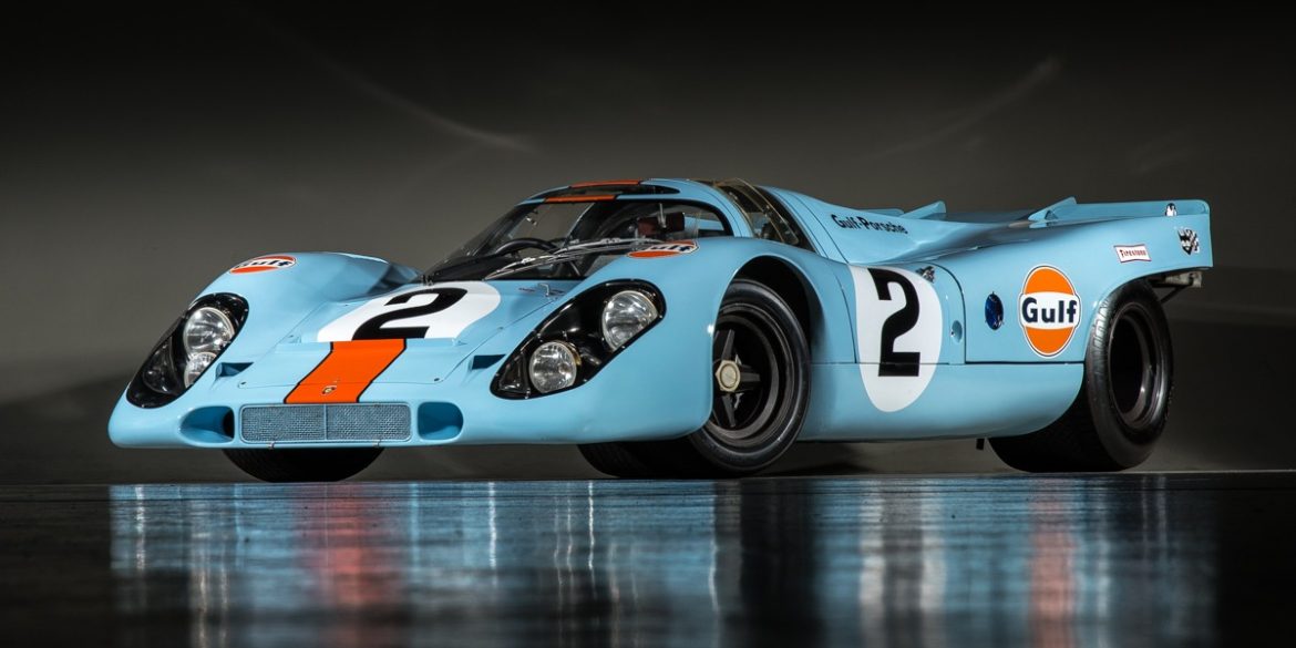 Front-angled view of a Porsche 917 finished with the blue and orange Gulf livery.