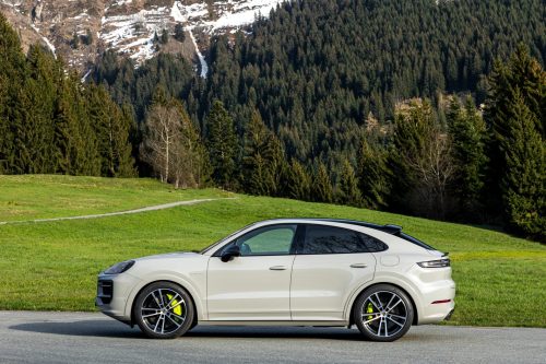 Side view of a 2024 Porsche Cayenne E-Hybrid Coupe