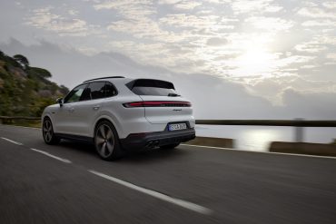 Three-quarter rear view of a 2024 Porsche Cayenne S E-Hybrid