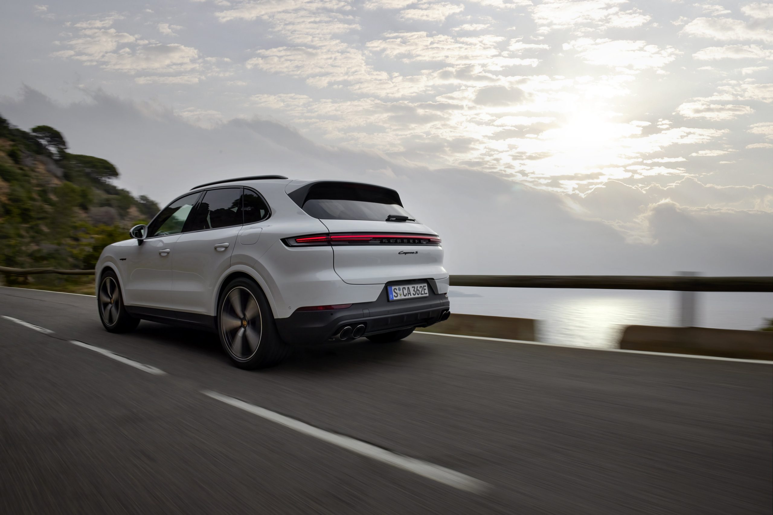 Three-quarter rear view of a 2024 Porsche Cayenne S E-Hybrid