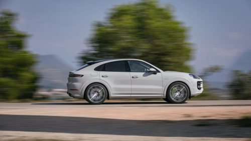 Side view of a 2024 Porsche Cayenne S E-Hybrid Coupe