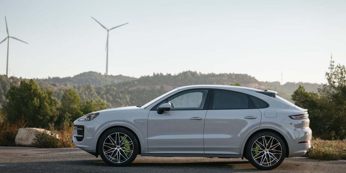Side view of a 2024 Porsche Cayenne S E-Hybrid Coupe