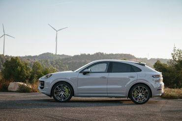 Side view of a 2024 Porsche Cayenne S E-Hybrid Coupe