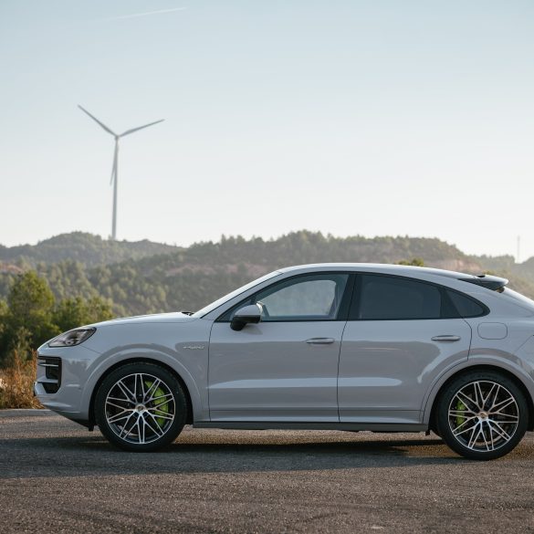 Side view of a 2024 Porsche Cayenne S E-Hybrid Coupe
