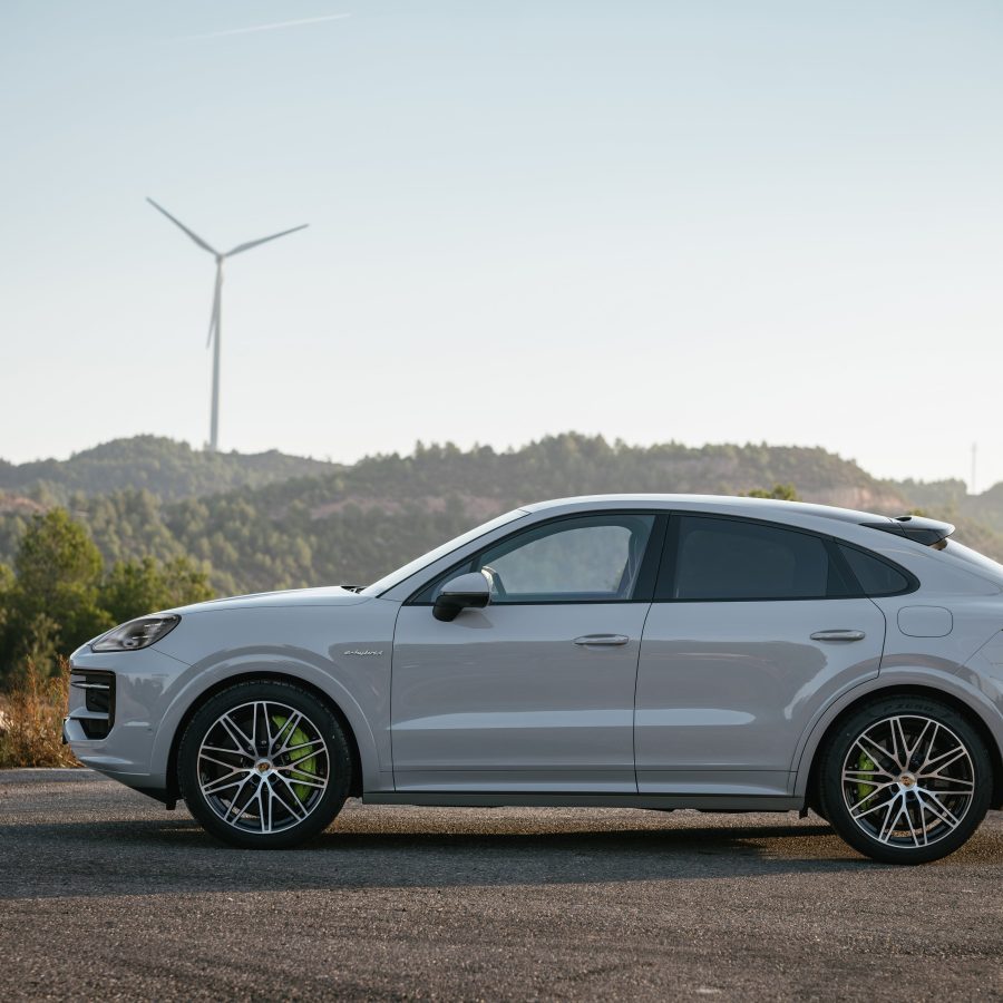 Side view of a 2024 Porsche Cayenne S E-Hybrid Coupe