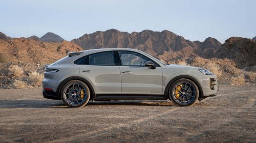Side view of a 2024 gray Porsche Cayenne GT