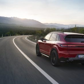 Rear view of a 2024 red Porsche Cayenne GTS