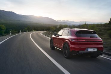 Rear view of a 2024 red Porsche Cayenne GTS