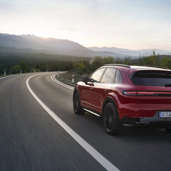 Rear view of a 2024 red Porsche Cayenne GTS