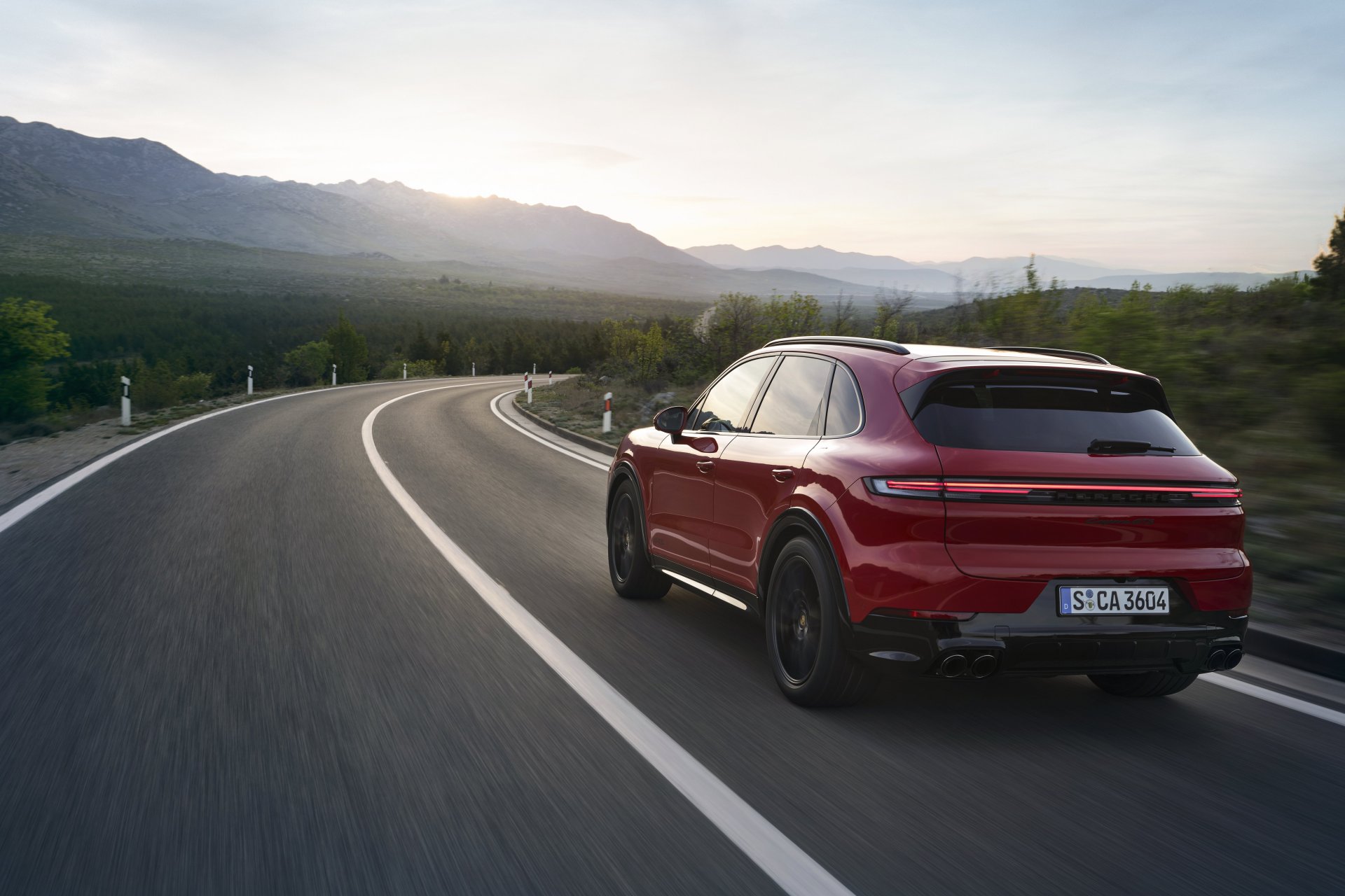 Rear view of a 2024 red Porsche Cayenne GTS