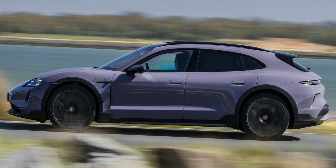Side view of a 2025 purple Porsche Taycan 4 Cross Turismo