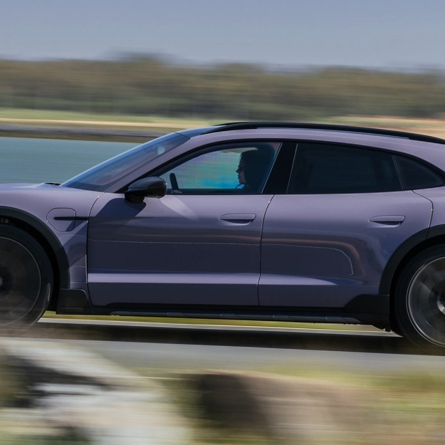 Side view of a 2025 purple Porsche Taycan 4 Cross Turismo