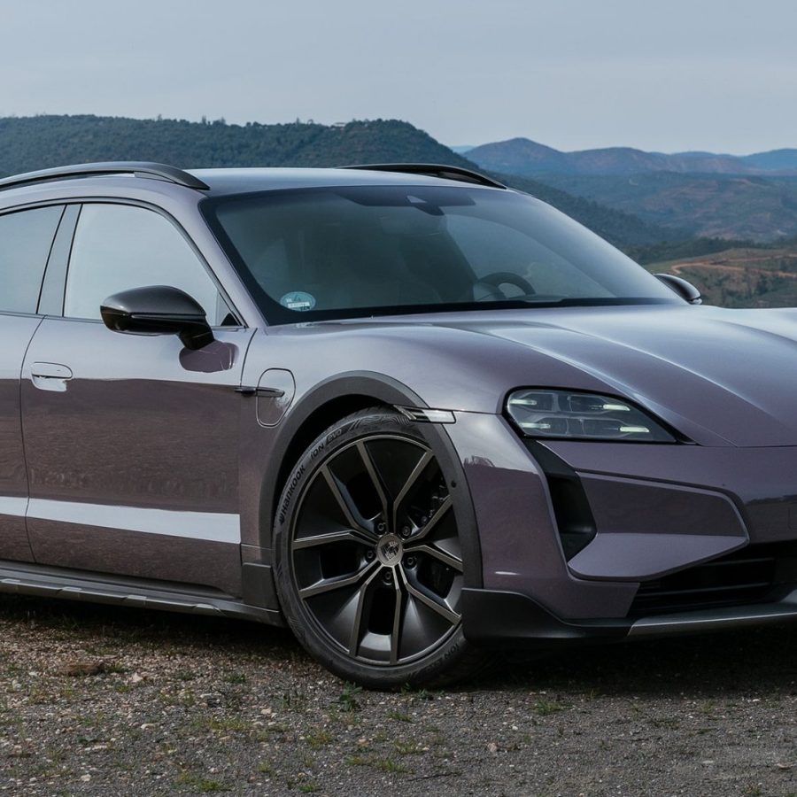 3/4 view of a 2025 purple Porsche Taycan 4 Cross Turismo