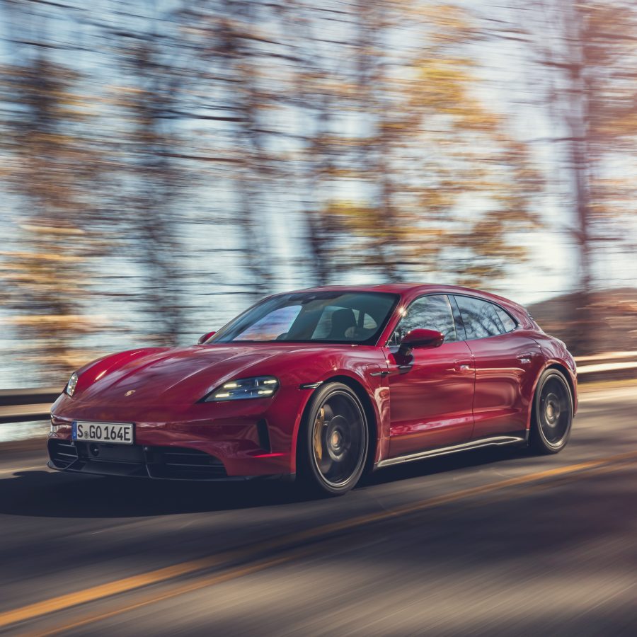 Three-quarter view of a 2025 red Porsche Taycan GTS Sport Turismo
