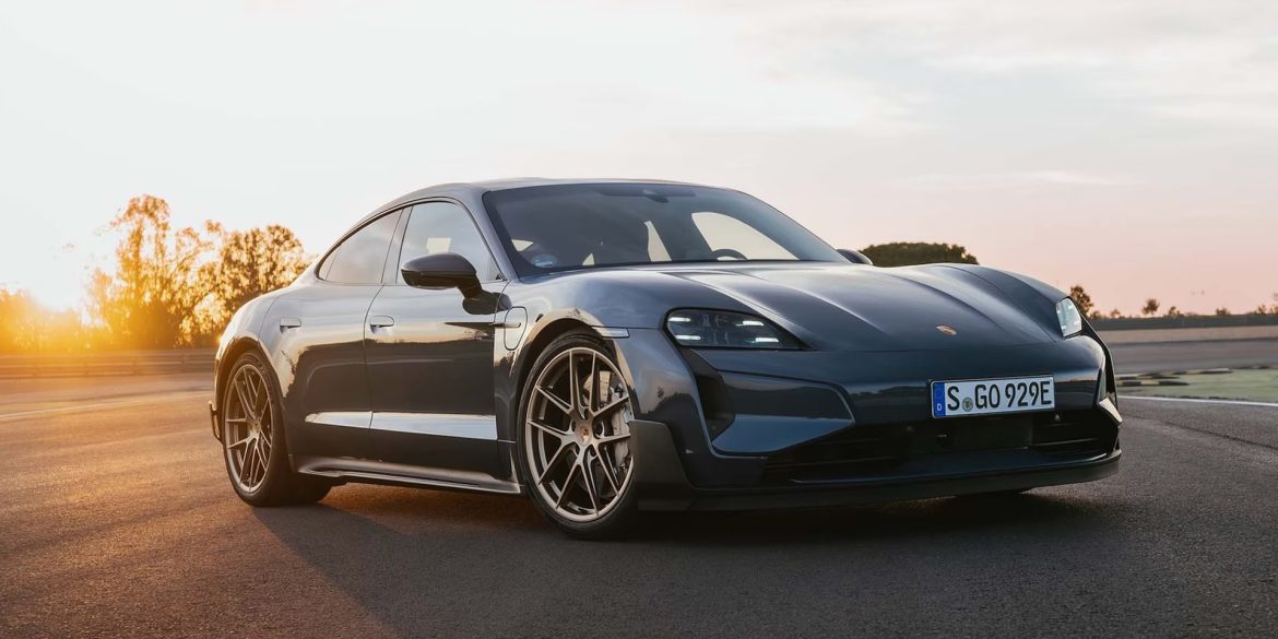 Three-quarter side view of a 2025 gray Porsche Taycan Turbo GT