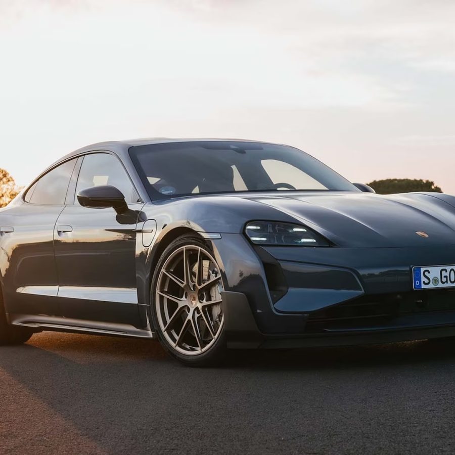 Three-quarter side view of a 2025 gray Porsche Taycan Turbo GT