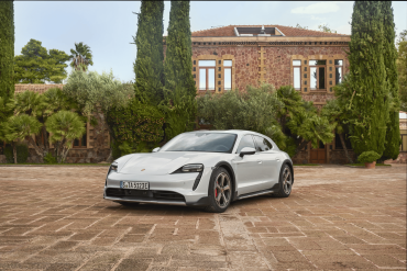3/4 view of a 2025 white Porsche Taycan 4 Cross Turismo