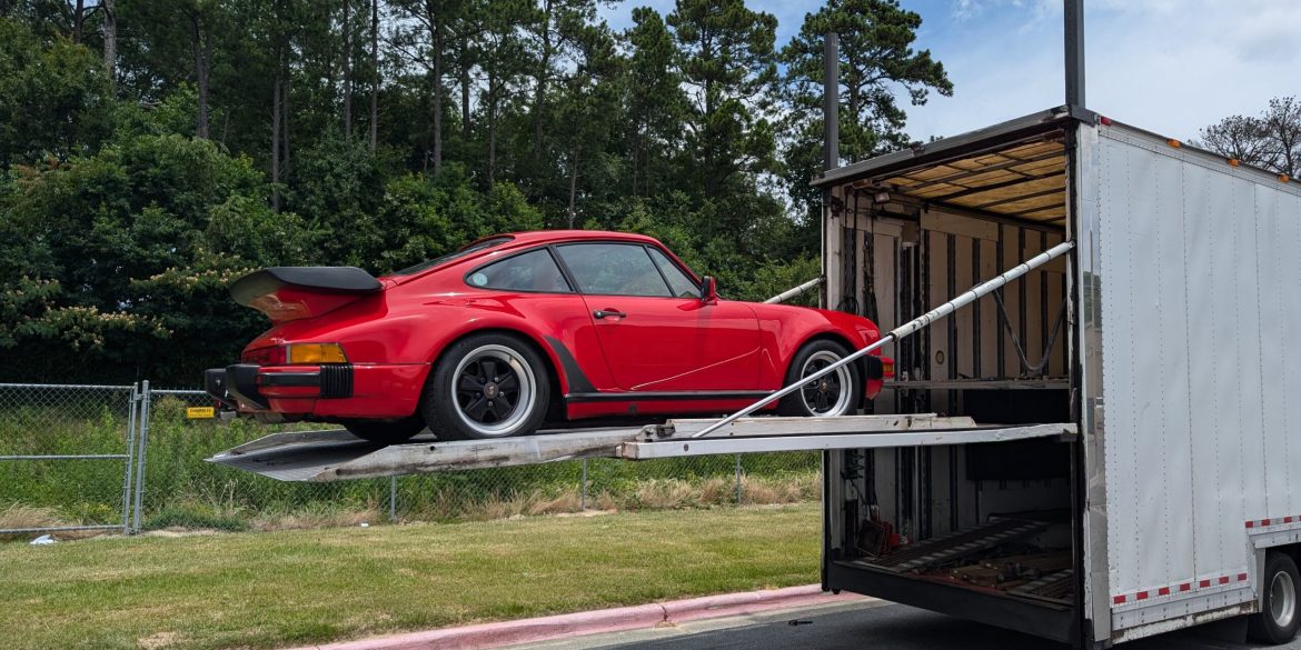 Porsche 911 Carrera M491 being unloaded from a trailer