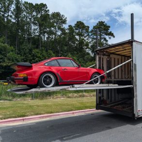 Porsche 911 Carrera M491 being unloaded from a trailer