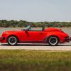 Side view of a 1989 red Porsche 911 Speedster