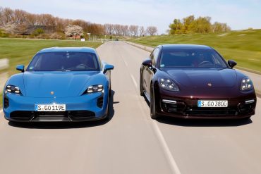 Blue Porsche Taycan and Porsche Panamera side by side on a road