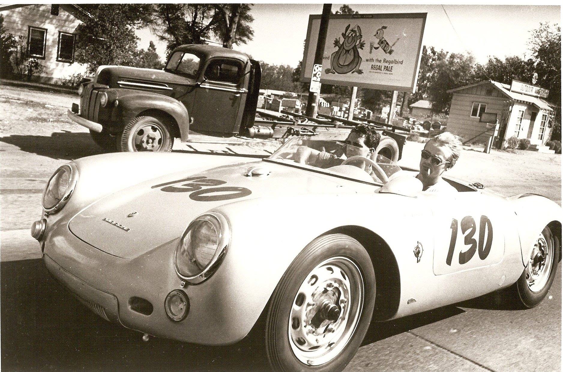 James Dean driving his 1955 Porsche 550 Spyder aka "Little Bastard" with Rolf Wutherich in the passenger seat