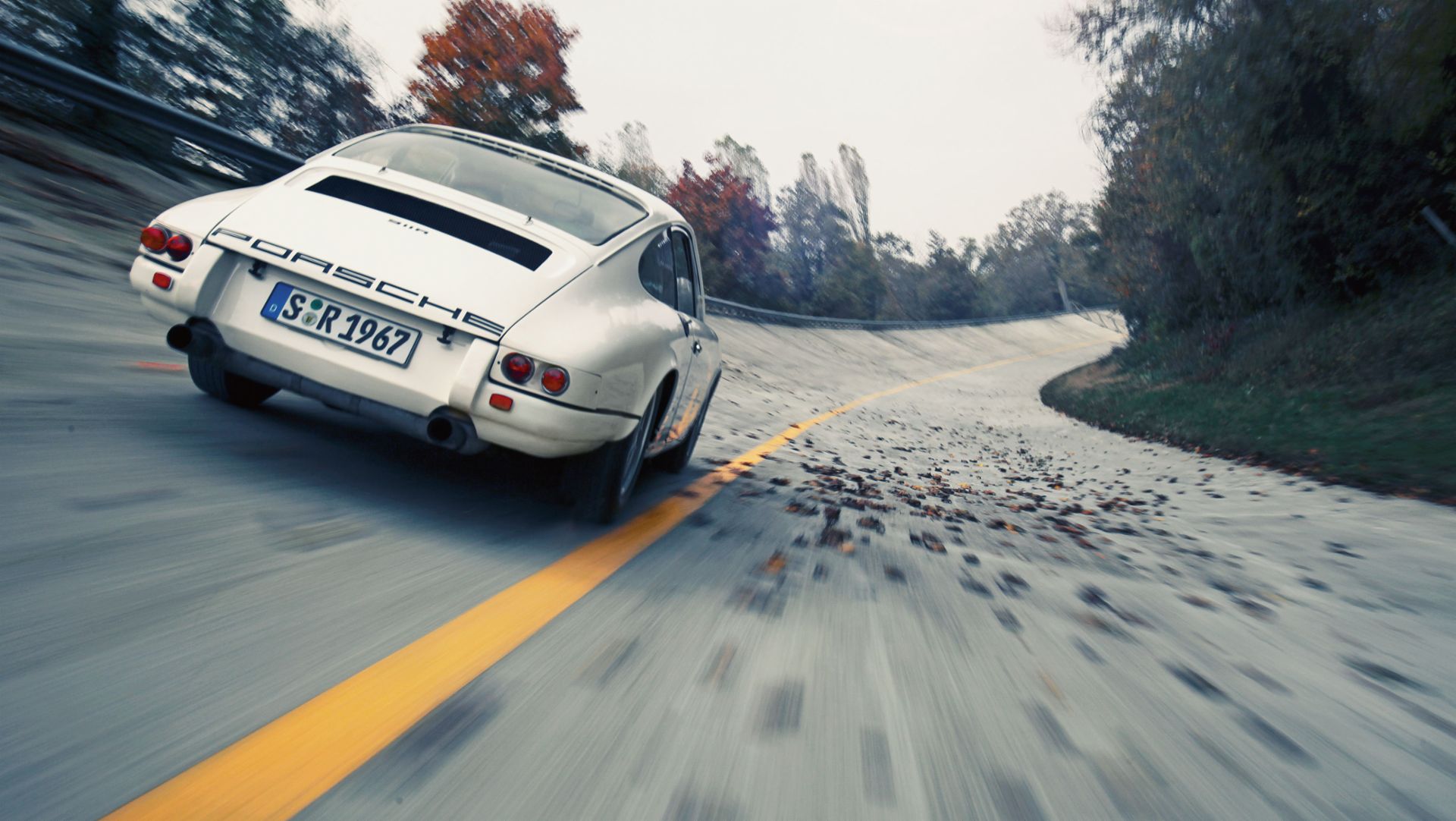 Rear view of a 1967 Porsche 911 R on a test track