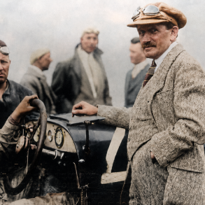 1924 Targa Florio and shows Alfred Neubauer at the wheel with Ferdinand Porsche standing at the right side of the car.