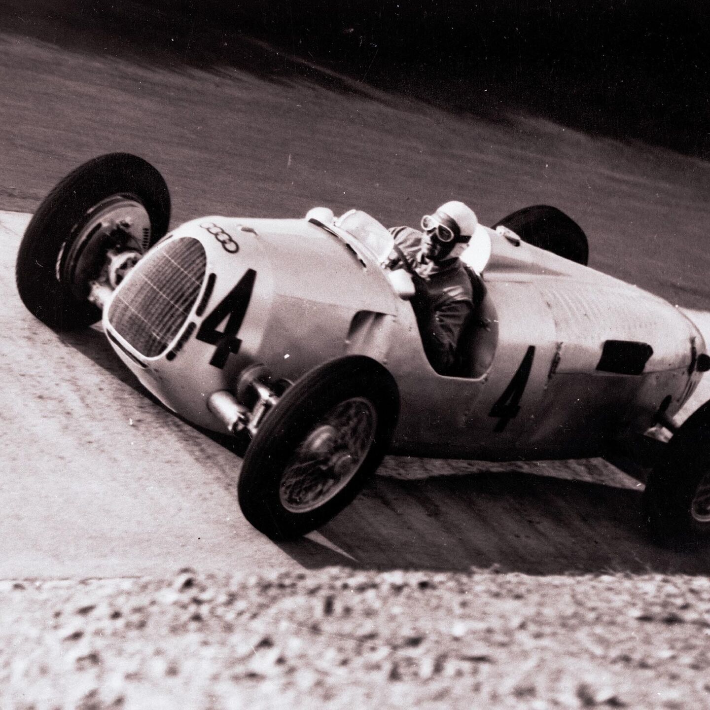 Bernd Rosemeyer found in the Auto Union Type C a machine that seemed uniquely matched to his instincts. Its immense V16 power, rearward weight concentration, and tendency to move dramatically at the limit demanded constant correction, yet Rosemeyer learned to work with those characteristics rather than fight them. Together, driver and car became the defining force of Auto Union’s 1936 campaign, carrying Rosemeyer to the European Championship and securing the Type C’s place among the most formidable Grand Prix machines of the prewar era.
