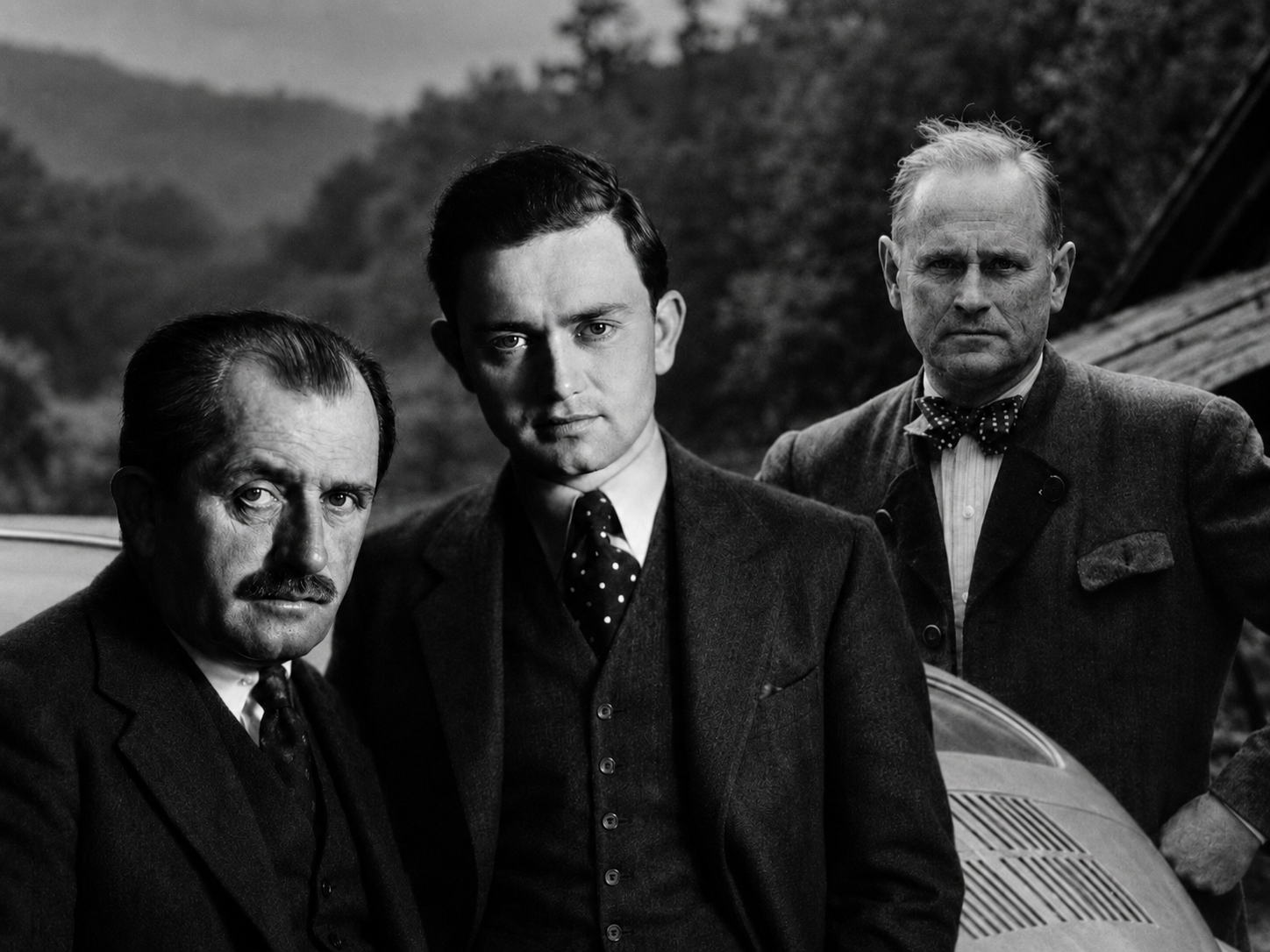 In December 1945, French authorities arrested Ferdinand Porsche, his son Ferry, and his son-in-law Anton Piëch while investigating their roles in Germany’s wartime industrial system. All three had been connected to enterprises that served the Nazi state, but their circumstances were not identical: Ferry was released after a comparatively brief detention, while Ferdinand and Piëch remained imprisoned in France for nearly twenty months. The arrests marked a sudden reversal for men who had once moved through the highest levels of German industry and government, replacing political access and technical authority with confinement, uncertainty, and the possibility of prosecution. Ferdinand Porsche was ultimately not convicted as a war criminal, but the episode forced the family to confront the legal and historical consequences of the relationships, contracts, and labor systems that had sustained its wartime work.